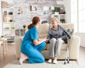 a nurse having conversation with patient