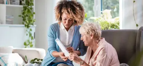 a-nurse-helping-client-read