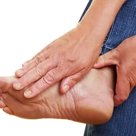 client-touching-their-feet